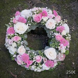 Couronne de fleurs funéraire rose
