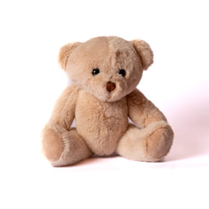 Ourson couleur crème pattes articulées